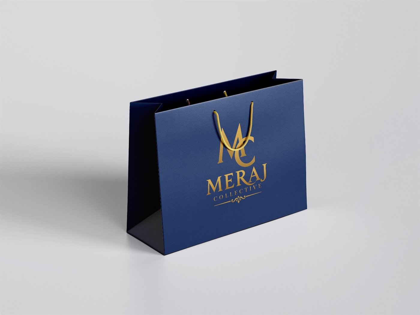 Meraj Collective navy and gold shopping bag